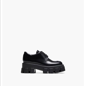 Prada monolith brushed leather lace-up loafers
